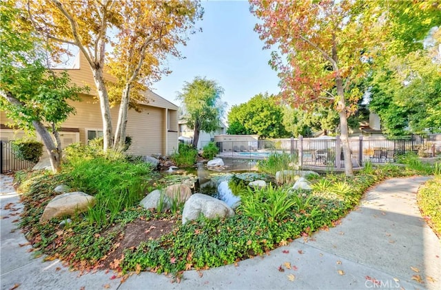 5441 Twin Lakes Dr, Cypress, CA 90630 - view of yard with a small pond