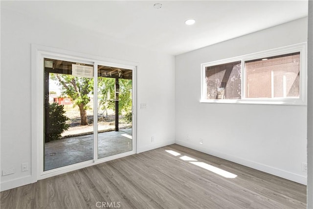 14855 Flathead Rd, Apple Valley, CA 92307 - unfurnished room with plenty of natural light, wood finished floors, baseboards, and recessed lighting