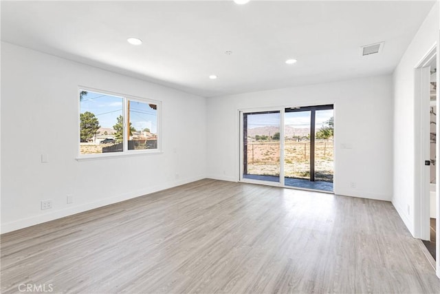 14855 Flathead Rd, Apple Valley, CA 92307 - empty room with wood finished floors, recessed lighting, and baseboards