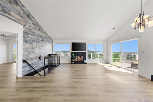 1435 Archwood Pl, Escondido, CA 92026 - unfurnished living room featuring high vaulted ceiling, wood finished floors, a multi sided fireplace, and baseboards