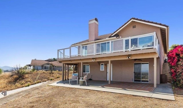 1435 Archwood Pl, Escondido, CA 92026 - back of house featuring a patio, stucco siding, and a chimney