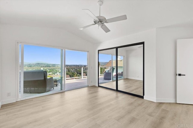 1435 Archwood Pl, Escondido, CA 92026 - unfurnished room featuring lofted ceiling, wood finished floors, a ceiling fan, baseboards, and a mountain view