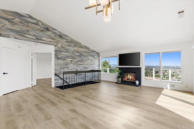 1435 Archwood Pl, Escondido, CA 92026 - unfurnished living room featuring a brick fireplace, wood finished floors, and high vaulted ceiling