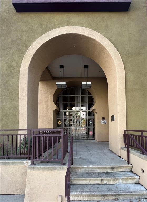 78 E Bay State St Unit 1E, Alhambra, CA 91801 - view of exterior entry featuring stucco siding