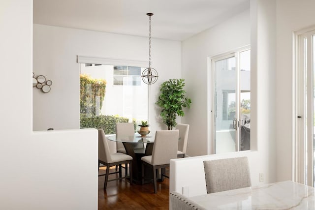 7784 Lookout Dr, La Jolla, CA 92037 - dining space with a chandelier and dark wood-style floors