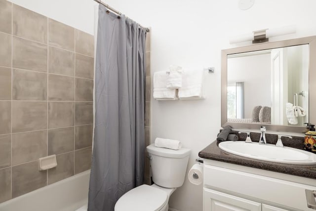 7784 Lookout Dr, La Jolla, CA 92037 - bathroom with toilet, vanity, and shower / bath combo