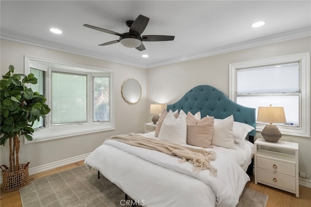 13782 Gershon Pl, North Tustin, CA 92705 - bedroom with multiple windows, light wood-type flooring, crown molding, recessed lighting, and a ceiling fan