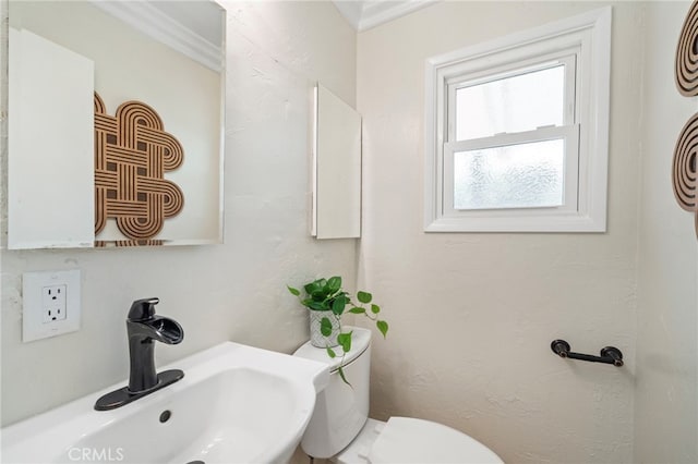 13782 Gershon Pl, North Tustin, CA 92705 - half bathroom with a sink and ornamental molding