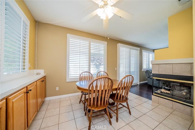 543 Northwood Ave, Banning, CA 92220 - dining room with ceiling fan, light tile patterned flooring, and baseboards