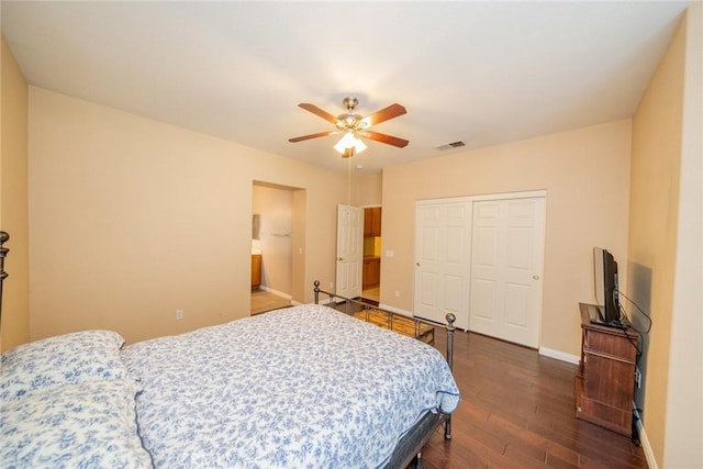 543 Northwood Ave, Banning, CA 92220 - bedroom featuring dark wood finished floors, a closet, and a ceiling fan