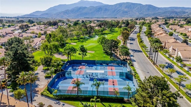 543 Northwood Ave, Banning, CA 92220 - aerial perspective of suburban area featuring a mountainous background and a local golf course