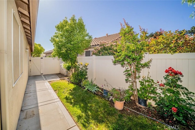 543 Northwood Ave, Banning, CA 92220 - fenced backyard featuring a gate