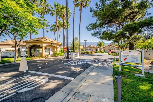 543 Northwood Ave, Banning, CA 92220 - view of asphalt street featuring traffic signs, curbs, and sidewalks