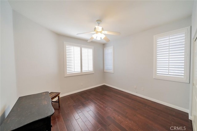 543 Northwood Ave, Banning, CA 92220 - spare room with a ceiling fan and dark wood-type flooring