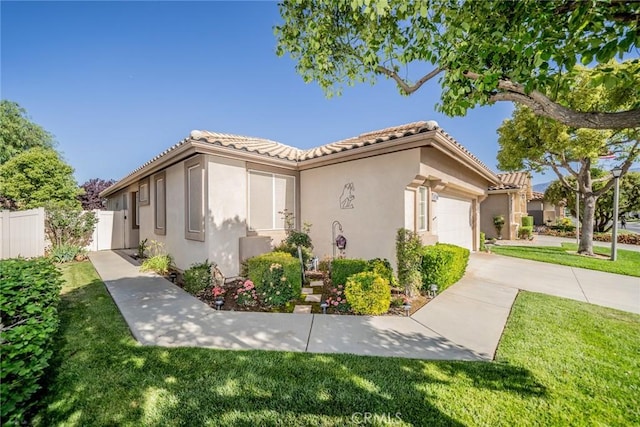 543 Northwood Ave, Banning, CA 92220 - view of side of home with stucco siding, an attached garage, a tiled roof, and concrete driveway
