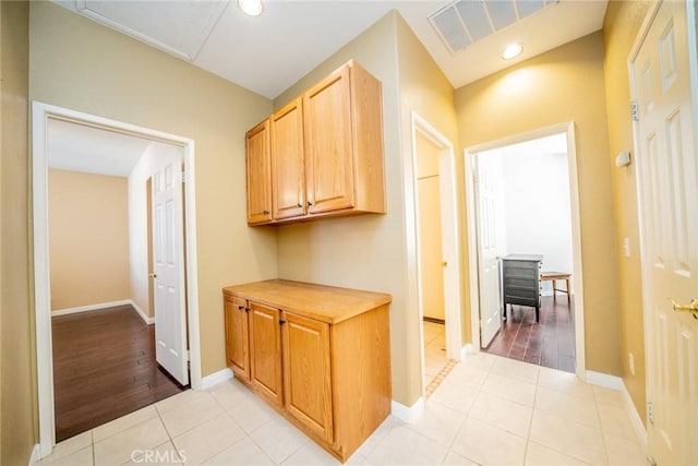 543 Northwood Ave, Banning, CA 92220 - corridor featuring light tile patterned flooring and baseboards