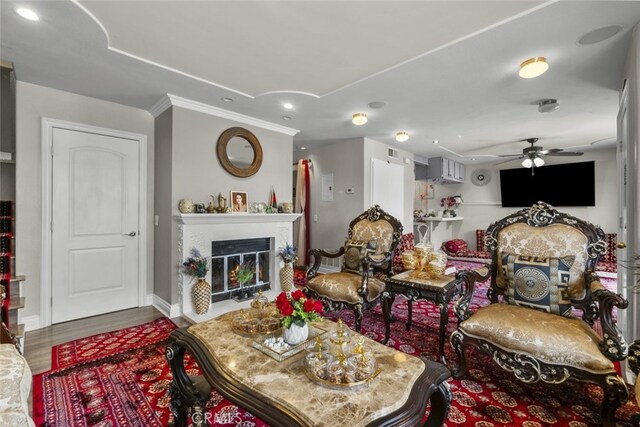 2346 Royal Ave Unit 9, Simi Valley, CA 93065 - living area featuring ceiling fan, a glass covered fireplace, wood finished floors, baseboards, and recessed lighting