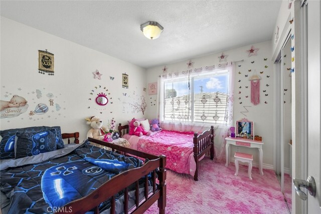 2346 Royal Ave Unit 9, Simi Valley, CA 93065 - carpeted bedroom with a textured ceiling