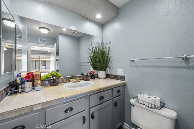 2346 Royal Ave Unit 9, Simi Valley, CA 93065 - bathroom with toilet, vanity, and a textured wall
