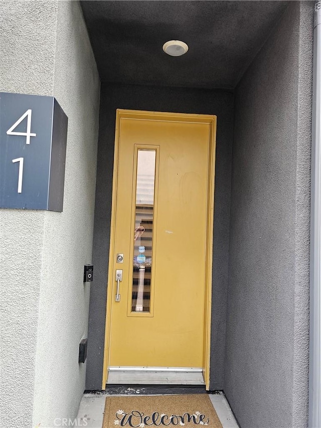 10402 Harlow Cir Unit 41, San Diego, CA 92108 - doorway to property featuring stucco siding