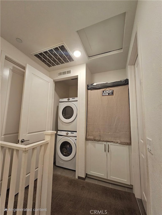 10402 Harlow Cir Unit 41, San Diego, CA 92108 - laundry area with stacked washing machine and dryer