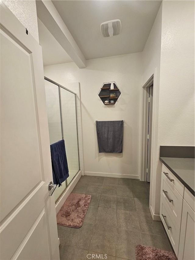 10402 Harlow Cir Unit 41, San Diego, CA 92108 - full bath with a shower stall, tile patterned floors, vanity, and baseboards
