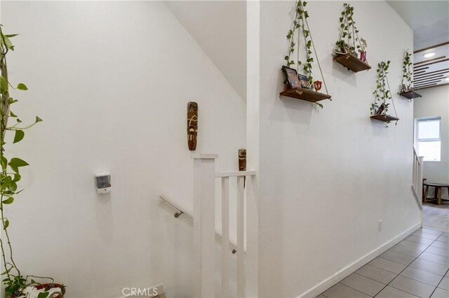 10402 Harlow Cir Unit 41, San Diego, CA 92108 - hall with light tile patterned floors and baseboards