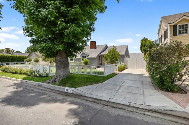 5023 Stern Ave, Sherman Oaks, CA 91423 - view of front facade with concrete driveway and a fenced front yard