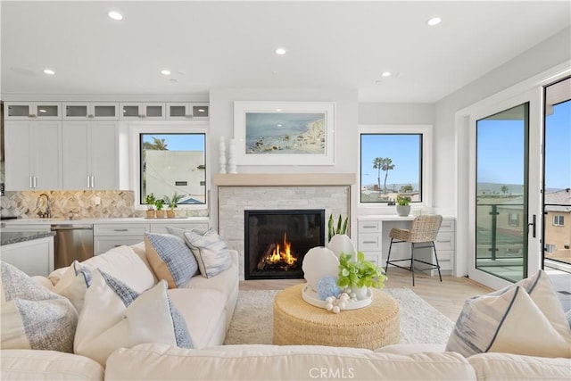 2141 Circle Dr, Hermosa Beach, CA 90254 - living room featuring plenty of natural light, light wood finished floors, a fireplace, and recessed lighting