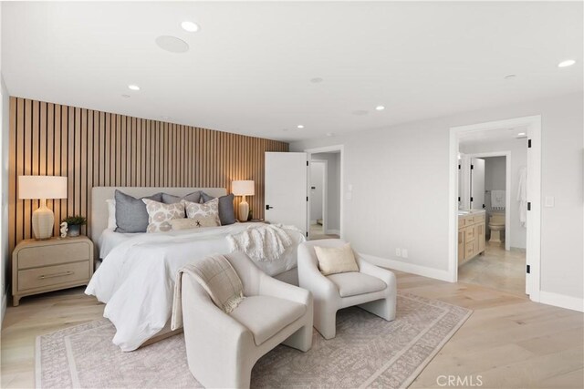 2141 Circle Dr, Hermosa Beach, CA 90254 - bedroom featuring an accent wall, baseboards, recessed lighting, and ensuite bath