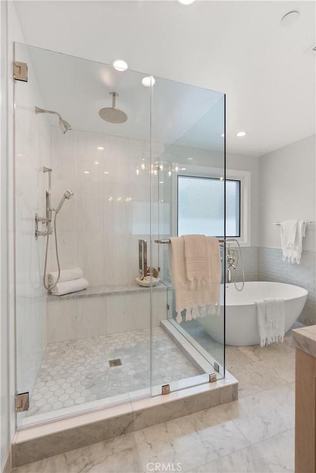 2141 Circle Dr, Hermosa Beach, CA 90254 - full bathroom with a stall shower, a soaking tub, marble look tile flooring, tile walls, and recessed lighting