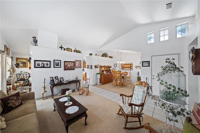 32725 Trailwood Ct, Wildomar, CA 92595 - living area featuring light tile patterned floors, high vaulted ceiling, and a chandelier