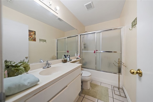 32725 Trailwood Ct, Wildomar, CA 92595 - bathroom featuring toilet, vanity, tile patterned floors, and shower / bath combination with glass door