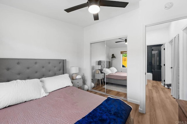6252 Lake Albano Ave, San Diego, CA 92119 - bedroom with wood finished floors, a closet, and ceiling fan