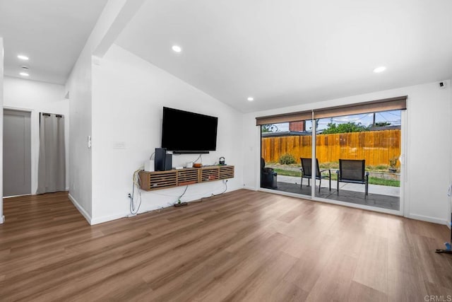 6252 Lake Albano Ave, San Diego, CA 92119 - unfurnished living room featuring wood finished floors, vaulted ceiling, recessed lighting, and baseboards