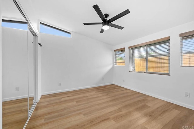 6252 Lake Albano Ave, San Diego, CA 92119 - unfurnished bedroom with light wood-style flooring, ceiling fan, a closet, and vaulted ceiling