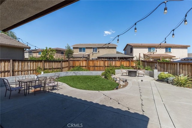 29590 Rawlings Way, Lake Elsinore, CA 92530 - fenced backyard featuring a patio area, a fire pit, and outdoor dining area