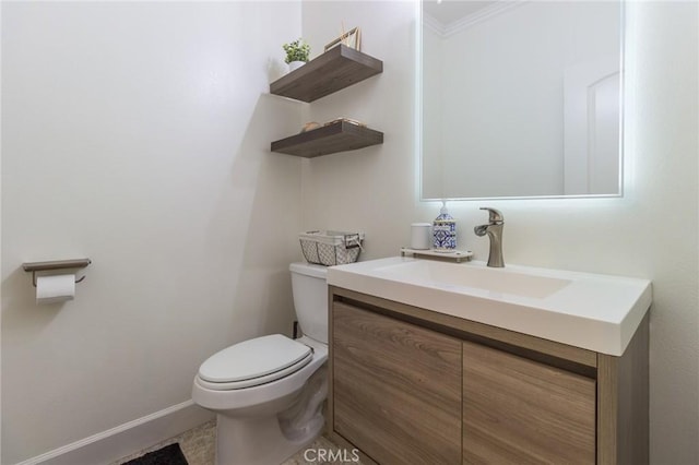 29590 Rawlings Way, Lake Elsinore, CA 92530 - half bath featuring vanity, toilet, baseboards, and ornamental molding