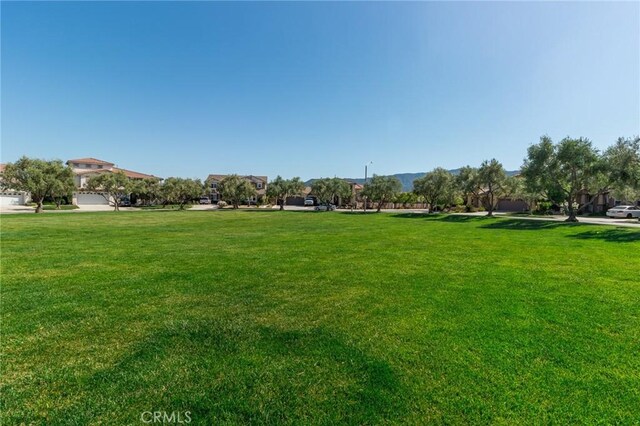 29590 Rawlings Way, Lake Elsinore, CA 92530 - surrounding community featuring a lawn