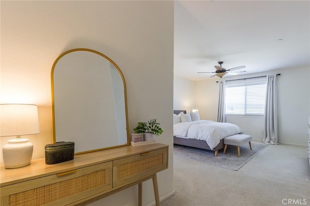 29590 Rawlings Way, Lake Elsinore, CA 92530 - bedroom with light colored carpet, a ceiling fan, and baseboards