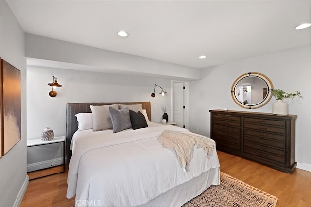2662 Salmon Dr, Los Alamitos, CA 90720 - bedroom featuring light wood-style floors, baseboards, and recessed lighting