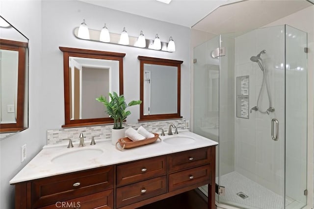 2662 Salmon Dr, Los Alamitos, CA 90720 - bathroom with a stall shower, double vanity, and tasteful backsplash