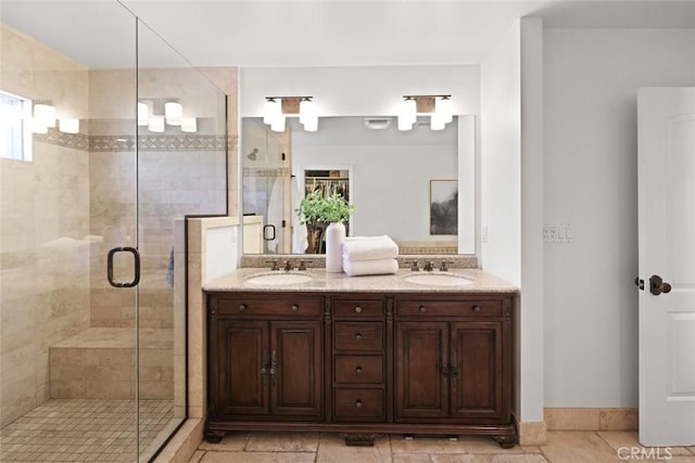 2662 Salmon Dr, Los Alamitos, CA 90720 - full bathroom featuring a shower stall, double vanity, and tile patterned floors