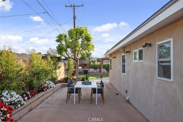 2662 Salmon Dr, Los Alamitos, CA 90720 - fenced backyard with outdoor dining space and a patio area