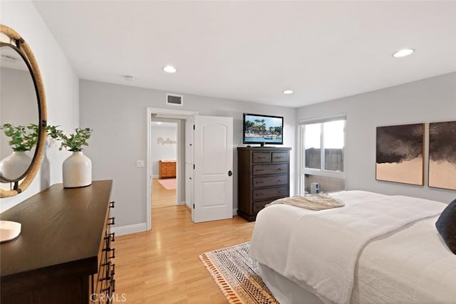 2662 Salmon Dr, Los Alamitos, CA 90720 - bedroom with light wood-type flooring, recessed lighting, and baseboards