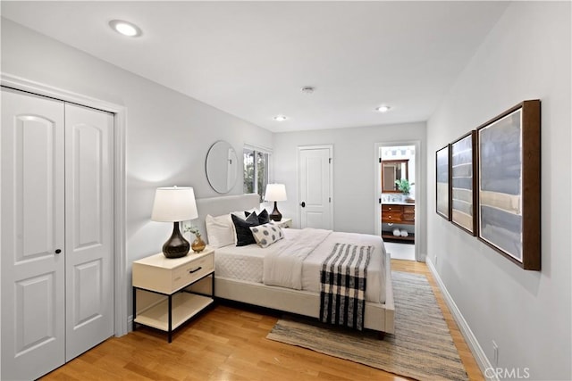 2662 Salmon Dr, Los Alamitos, CA 90720 - bedroom featuring light wood-style flooring, baseboards, and recessed lighting