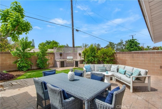 2662 Salmon Dr, Los Alamitos, CA 90720 - fenced backyard featuring a patio and an outdoor hangout area