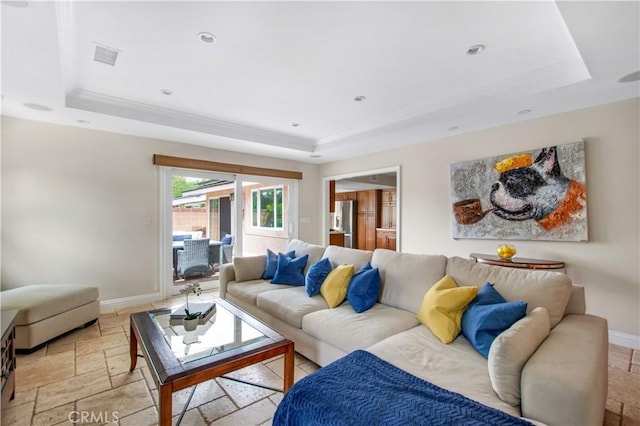 2662 Salmon Dr, Los Alamitos, CA 90720 - living area featuring a raised ceiling, baseboards, stone tile floors, crown molding, and recessed lighting