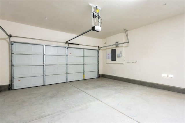 13119 Lancaster St, Hesperia, CA 92344 - garage with a garage door opener, baseboards, and electric panel