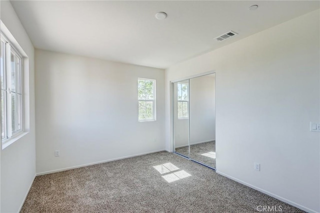 13119 Lancaster St, Hesperia, CA 92344 - unfurnished bedroom with carpet flooring, baseboards, and a closet